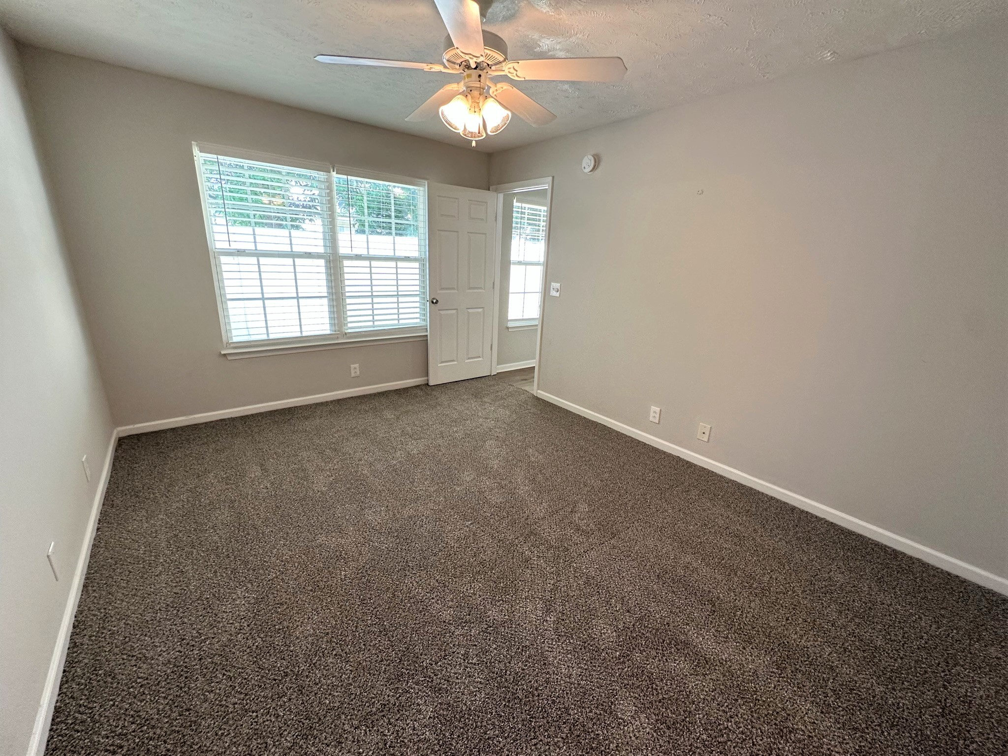 113 Lancaster Gate Place Murfreesboro, TN 37128 - Photo 11 of 28 an empty room with a window and a ceiling fan