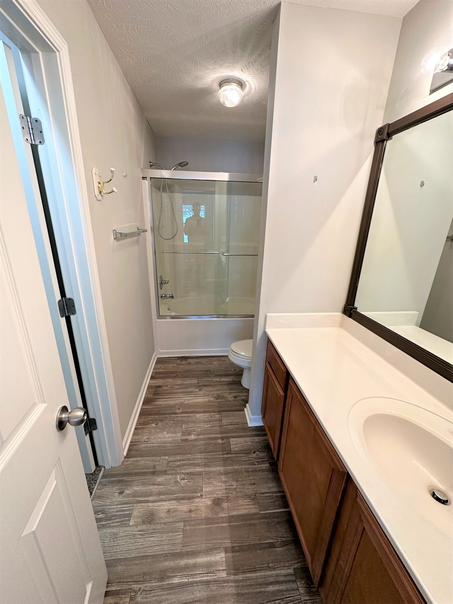 113 Lancaster Gate Place Murfreesboro, TN 37128 - Photo 15 of 28 a bathroom with a sink a toilet a mirror and vanity