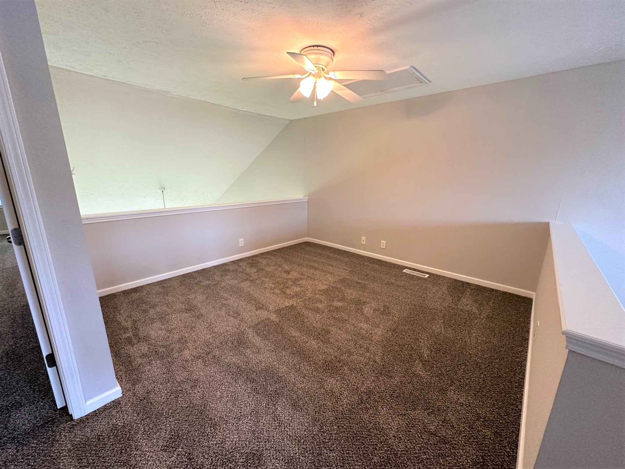 113 Lancaster Gate Place Murfreesboro, TN 37128 - Photo 26 of 28 an empty room with a ceiling fan and a window
