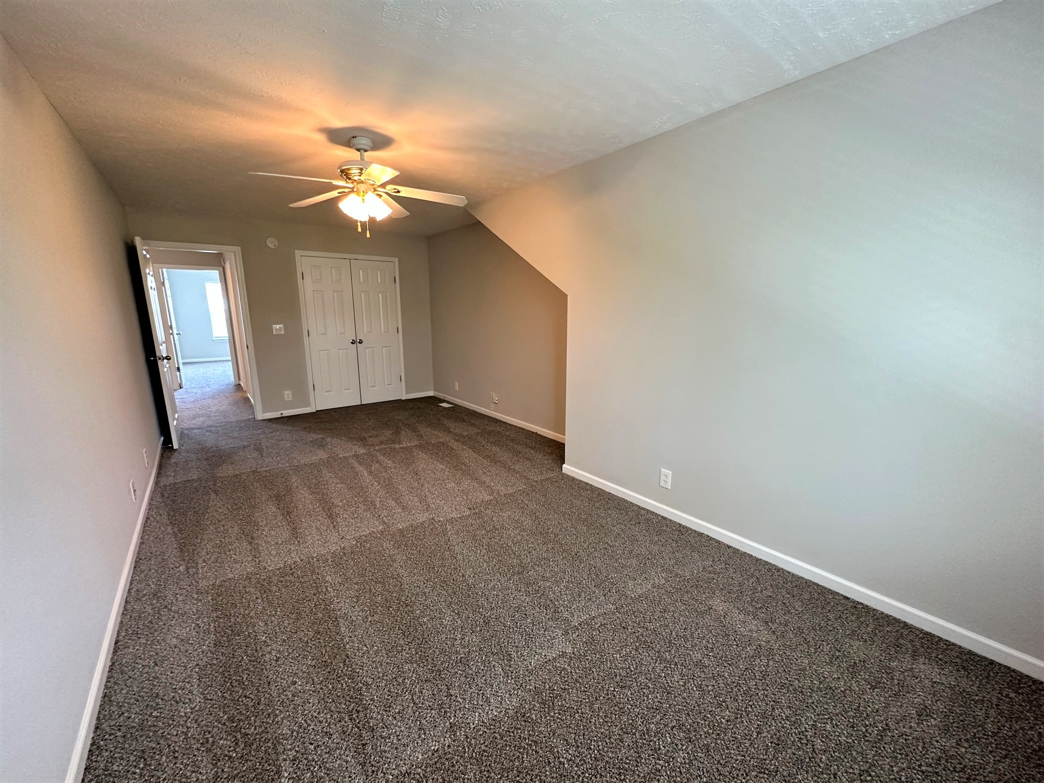 113 Lancaster Gate Place Murfreesboro, TN 37128 - Photo 27 of 28 a view of a big room with chandelier fan and windows