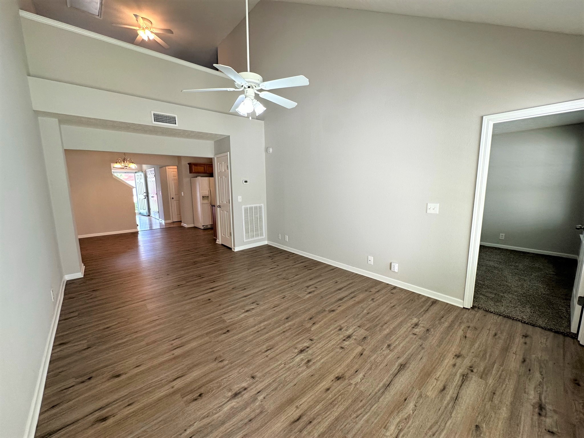 113 Lancaster Gate Place Murfreesboro, TN 37128 - Photo 3 of 28 wooden floor in an empty room with a window