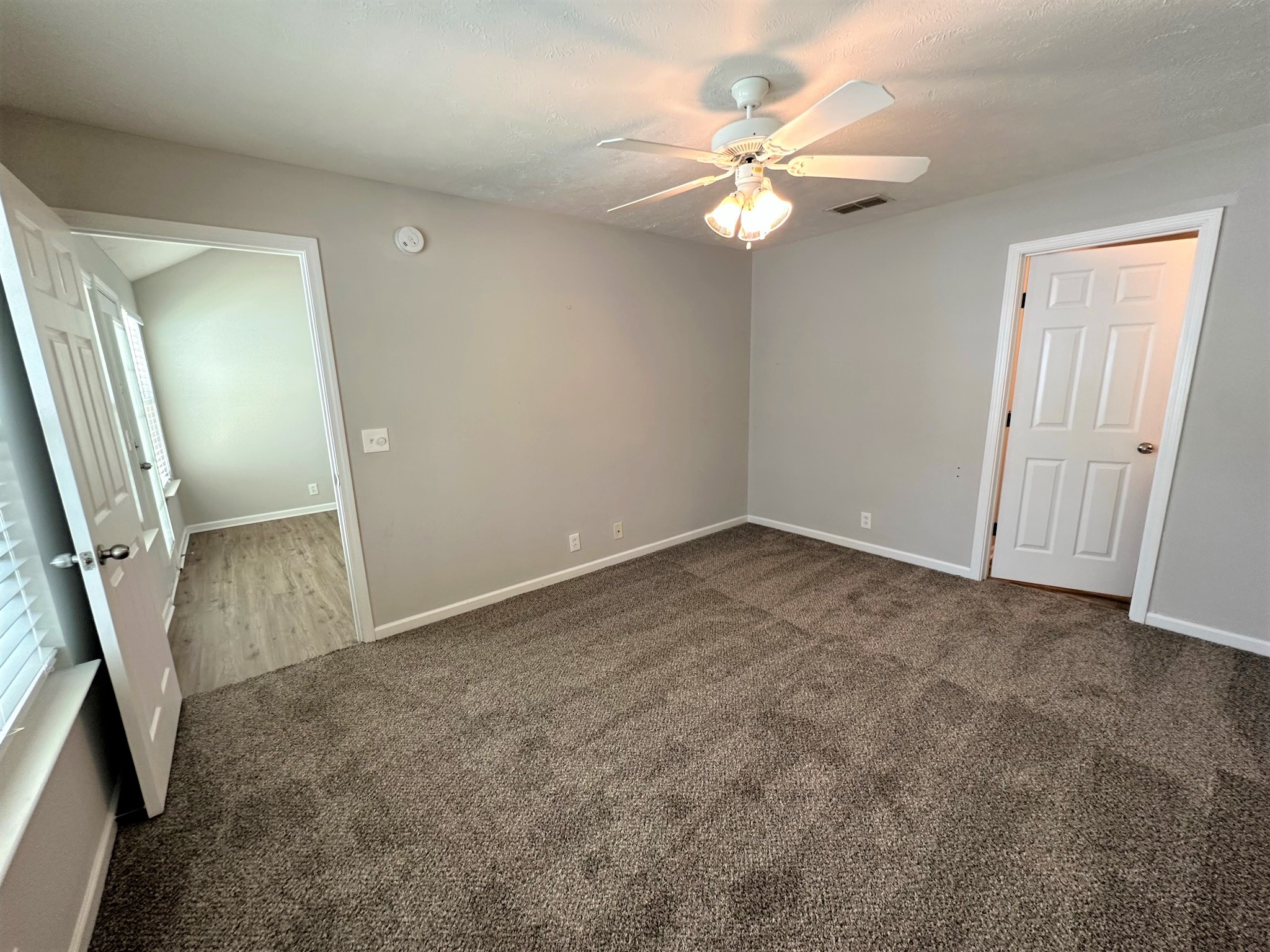 113 Lancaster Gate Place Murfreesboro, TN 37128 - Photo 9 of 28 an empty room with windows and entrance