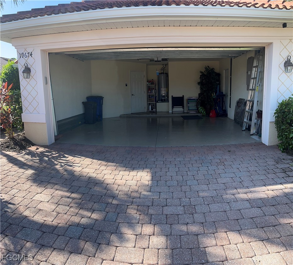 19674 Villa Rosa Loop Estero, FL 33967 - Photo 17 of 33 a view of a porch with a bench