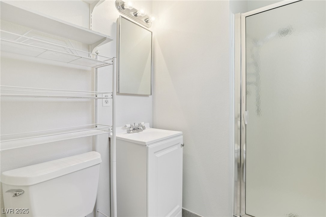 4027 Maple Hill Road Las Vegas, NV 89115 - Photo 24 of 46 Full bath with vanity and a stall shower