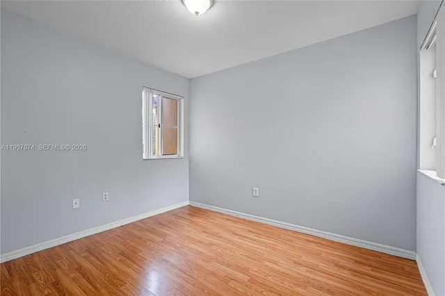 a view of a room with refrigerator