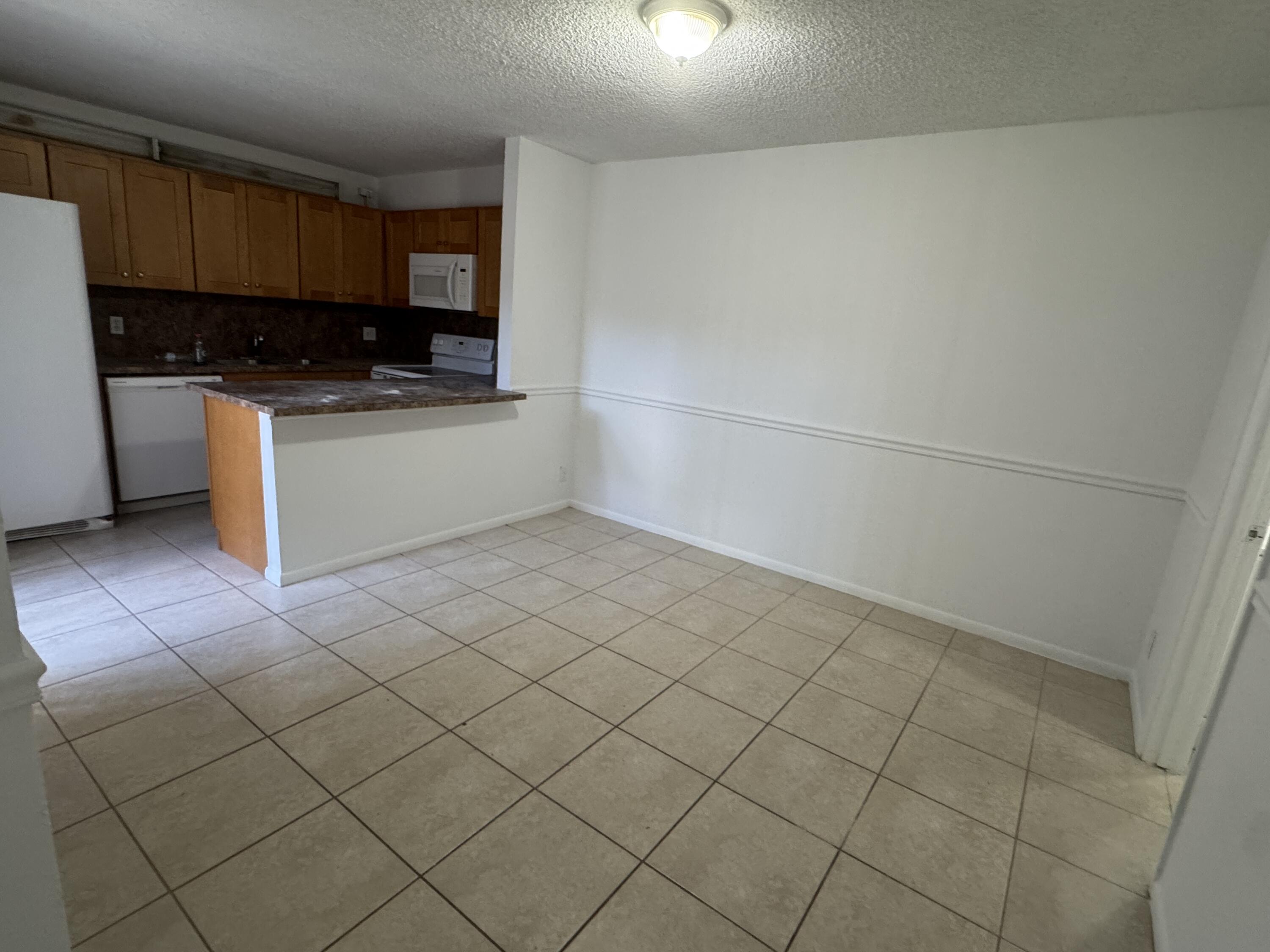 238 Woodland Road Palm Springs, FL 33461 - Photo 5 of 12 IMG_5686