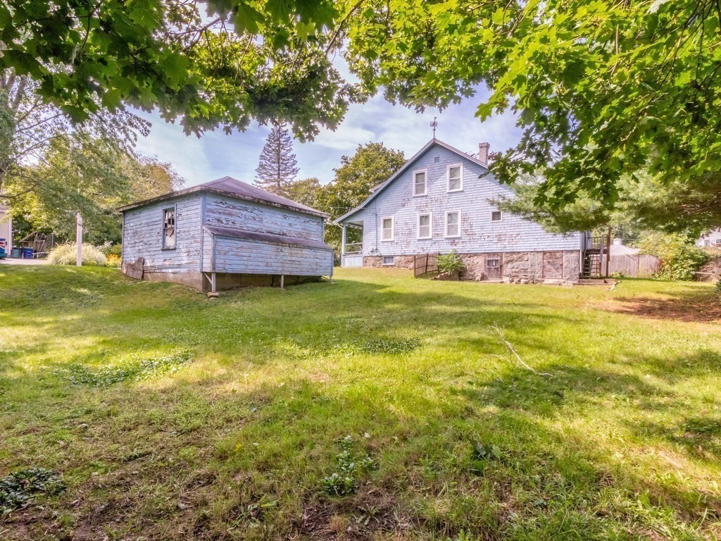 12 Carter Road Braintree, MA 02184 - Photo 14 of 34 a house view with a garden space