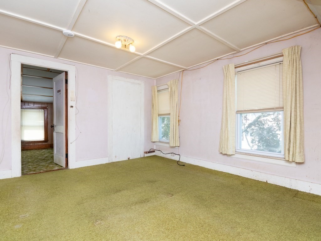 12 Carter Road Braintree, MA 02184 - Photo 16 of 34 a view of an empty room with window and closet area