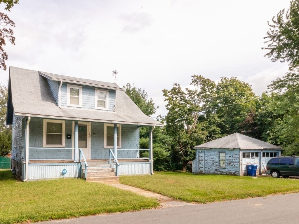 12 Carter Road Braintree, MA 02184 - Photo 2 of 34 a house with garden in front of it