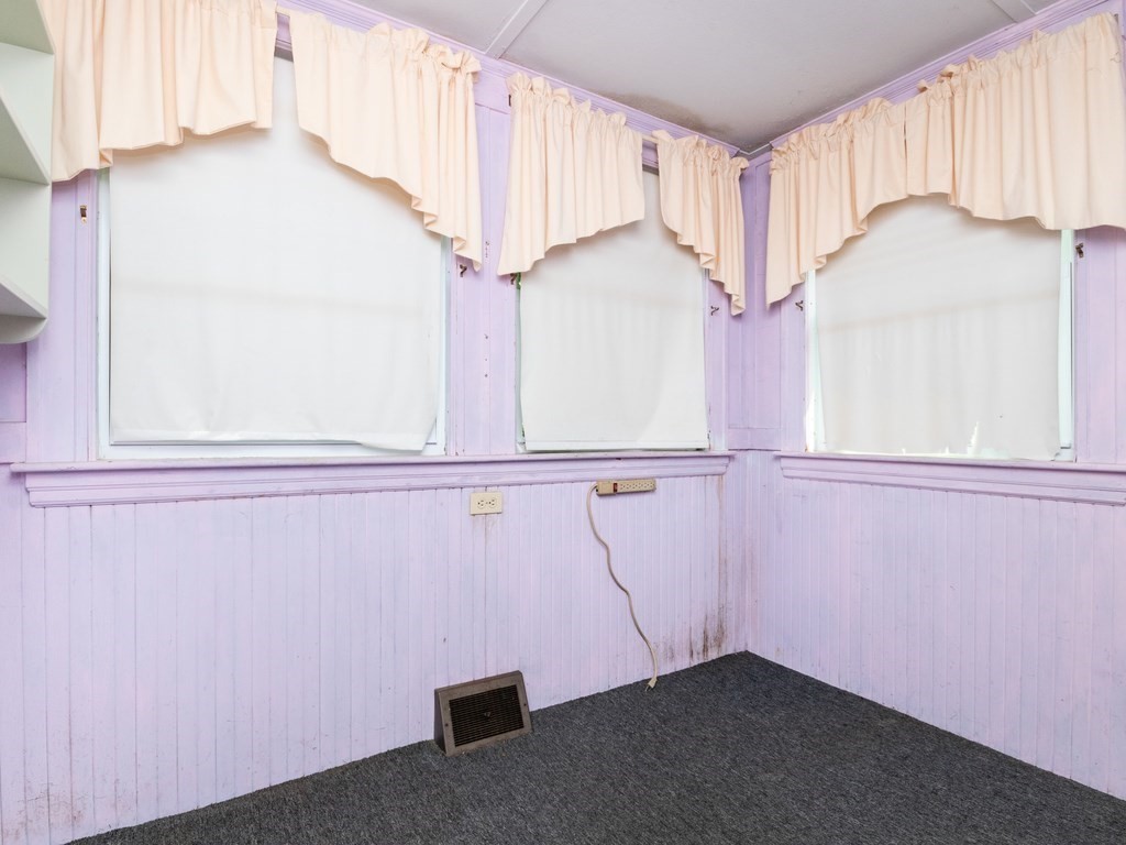 12 Carter Road Braintree, MA 02184 - Photo 23 of 34 a view of a closet with white walls