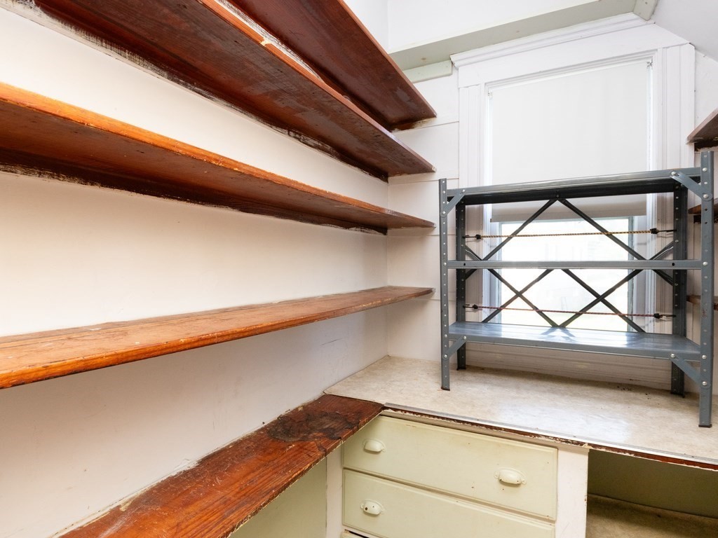 12 Carter Road Braintree, MA 02184 - Photo 24 of 34 a view of walk in closet with clothes and shoes