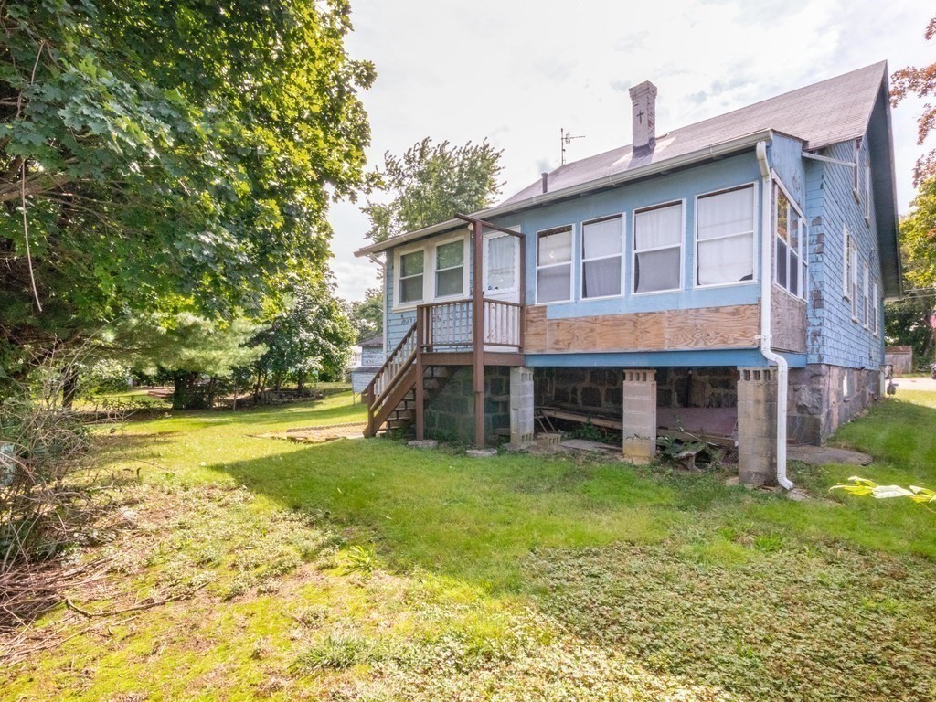 12 Carter Road Braintree, MA 02184 - Photo 5 of 34 a view of a house with a yard balcony and sitting area