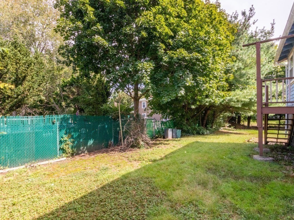 12 Carter Road Braintree, MA 02184 - Photo 7 of 34 a view of backyard with tree