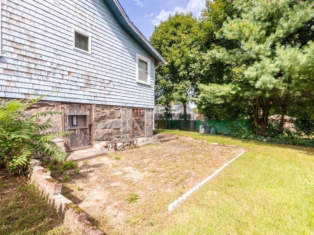 12 Carter Road Braintree, MA 02184 - Photo 9 of 34 a view of a house with yard and sitting area