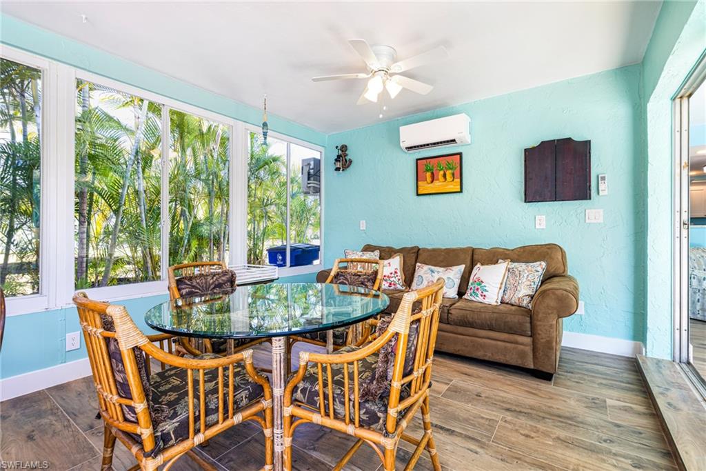 4817-4819 Gary Road Bonita Springs, FL 34134 - Photo 13 of 48 a view of a dining room with furniture window and outside view