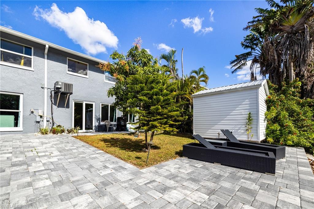4817-4819 Gary Road Bonita Springs, FL 34134 - Photo 24 of 48 a view of a house with backyard and sitting area