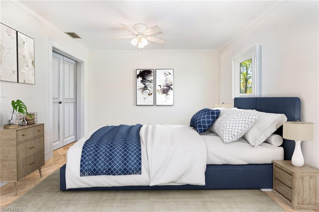 4817-4819 Gary Road Bonita Springs, FL 34134 - Photo 39 of 48 a bedroom with a bed and window