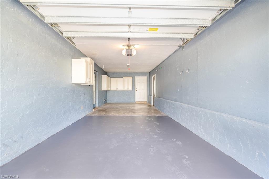 4817-4819 Gary Road Bonita Springs, FL 34134 - Photo 42 of 48 a view of empty room with a ceiling fan