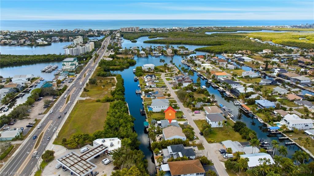 4817-4819 Gary Road Bonita Springs, FL 34134 - Photo 48 of 48 an aerial view of residential building and lake