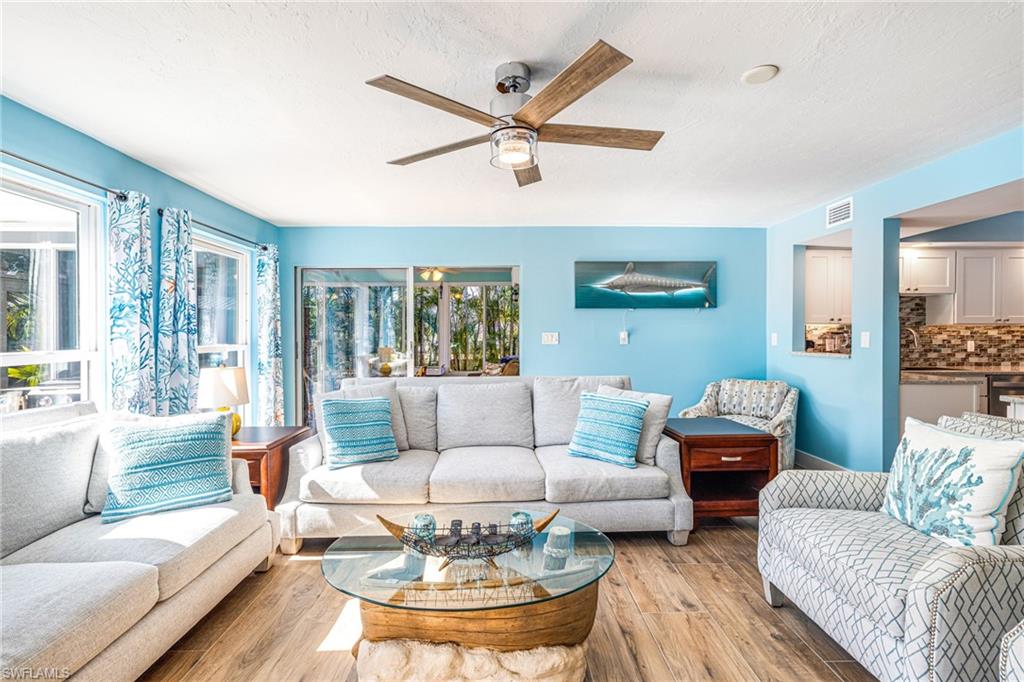 4817-4819 Gary Road Bonita Springs, FL 34134 - Photo 5 of 48 a living room with furniture and a large window
