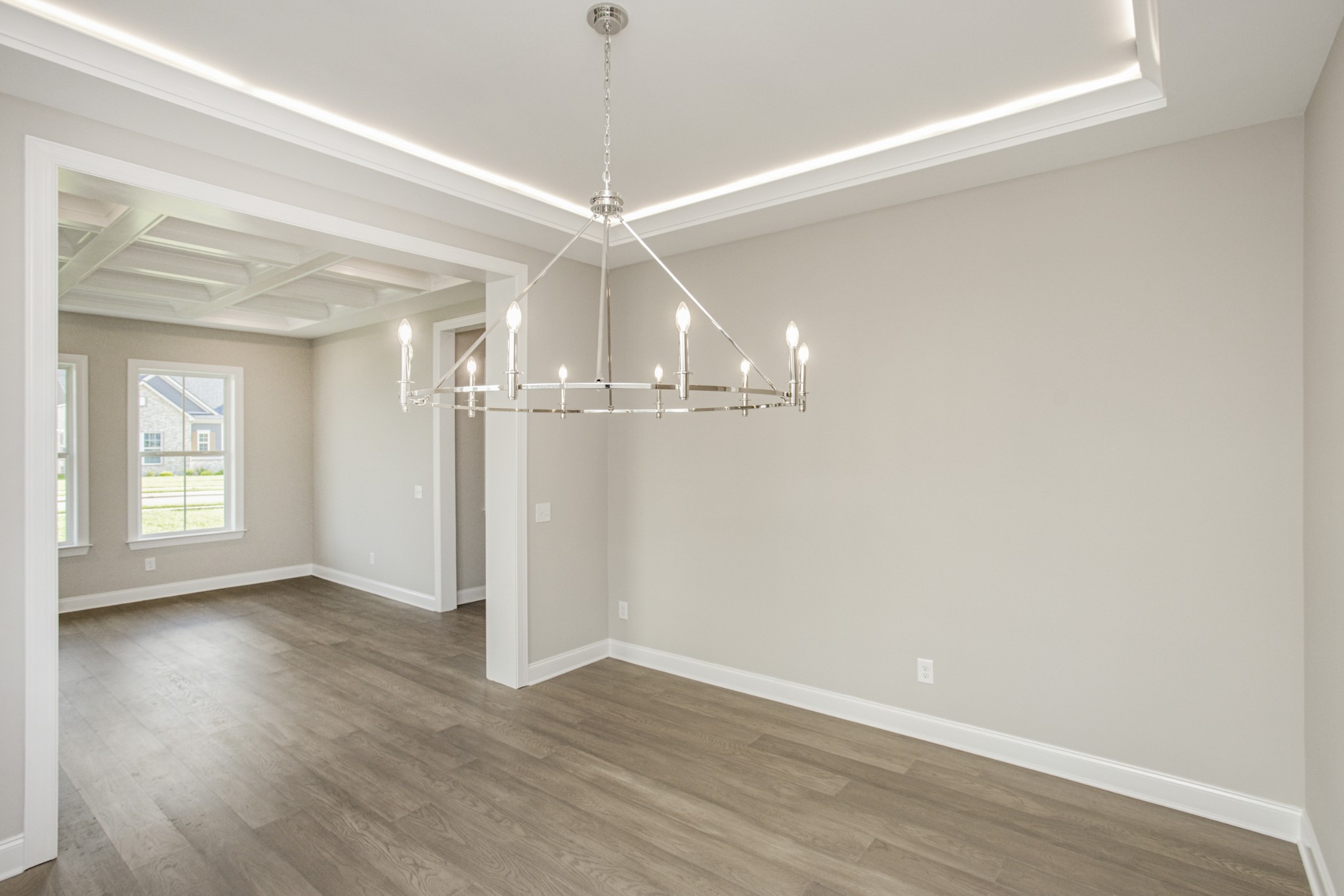 7005 Thunderhead Way Spring Hill, TN 37174 - Photo 16 of 63 wooden floor in an empty room with a window