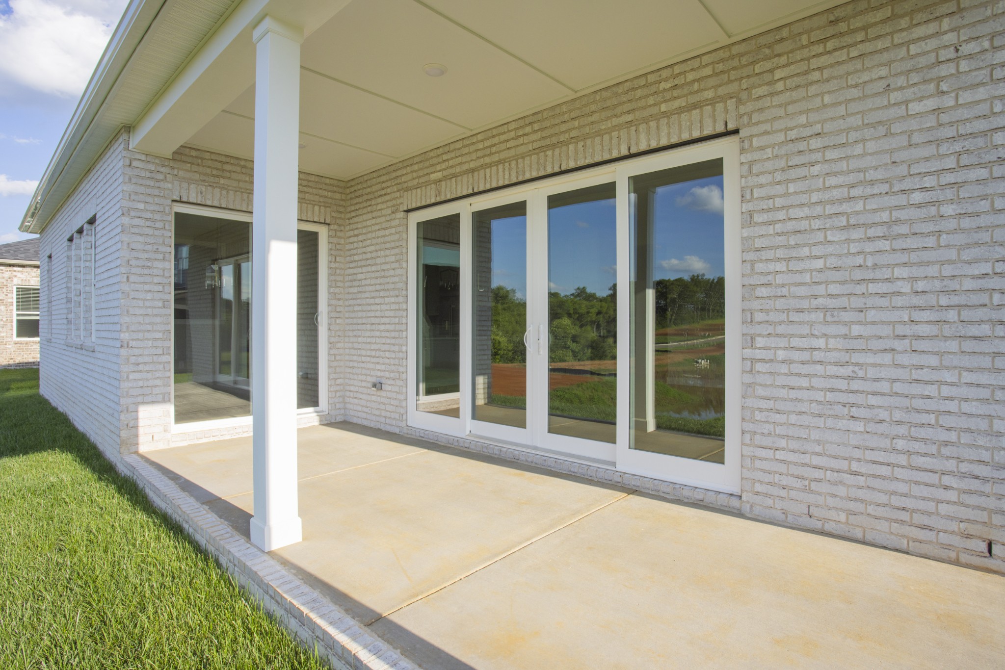 7005 Thunderhead Way Spring Hill, TN 37174 - Photo 60 of 63 a view of a brick house with a large window