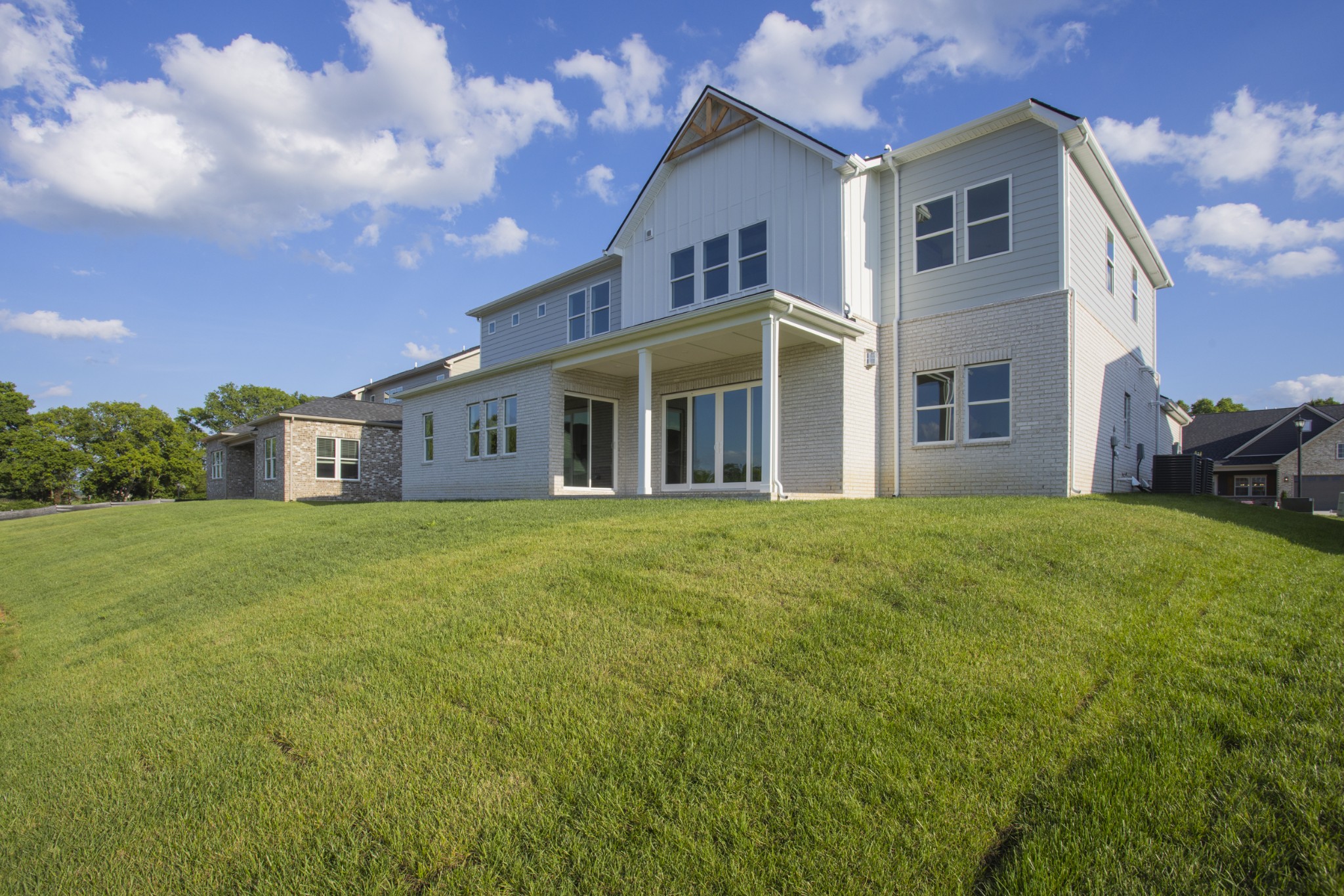 7005 Thunderhead Way Spring Hill, TN 37174 - Photo 61 of 63 a front view of a house with a garden
