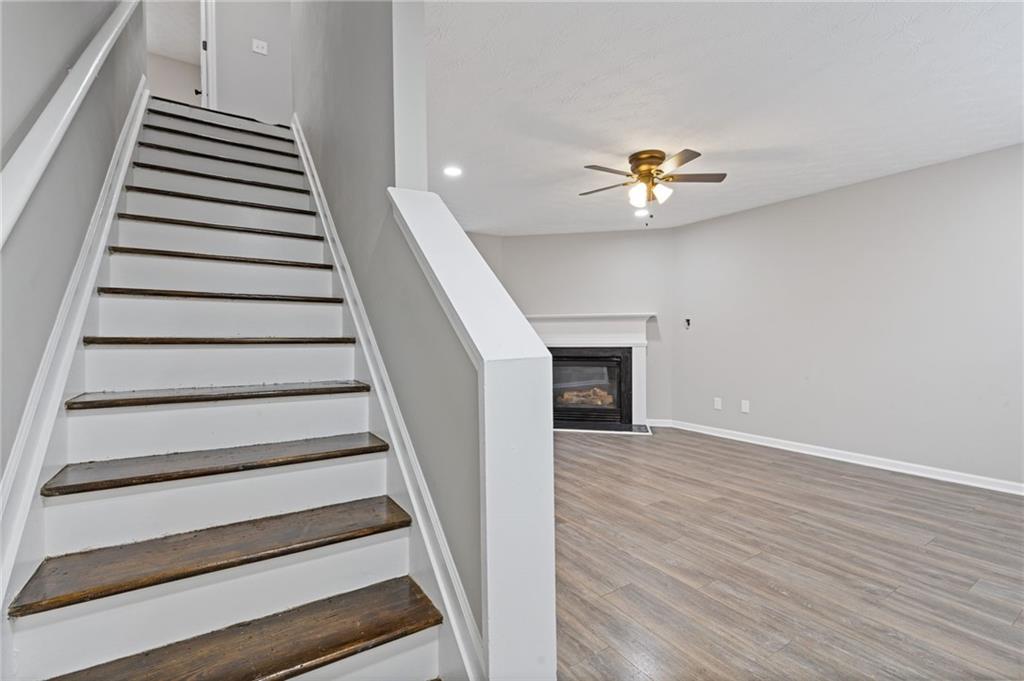 441 Spring Head Court Lawrenceville, GA 30046 - Photo 14 of 27 a view of entryway and hall with wooden floor