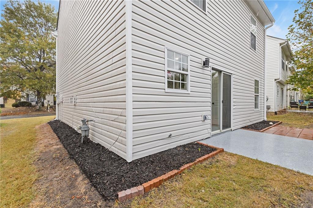 441 Spring Head Court Lawrenceville, GA 30046 - Photo 25 of 27 a view of a backyard with white door