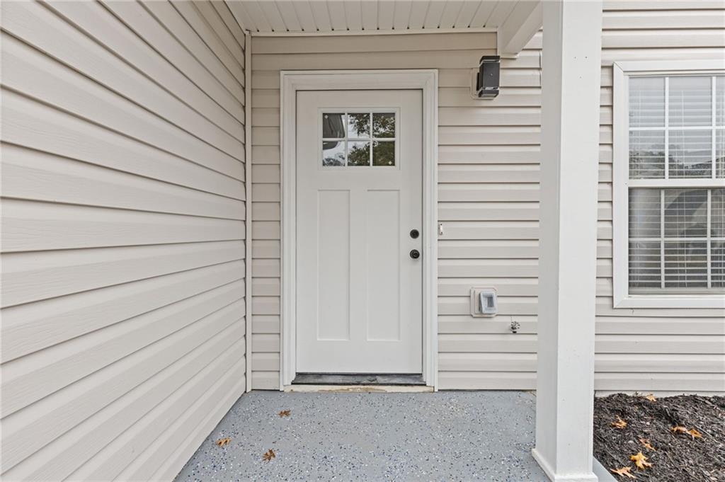 441 Spring Head Court Lawrenceville, GA 30046 - Photo 4 of 27 a view of wooden door