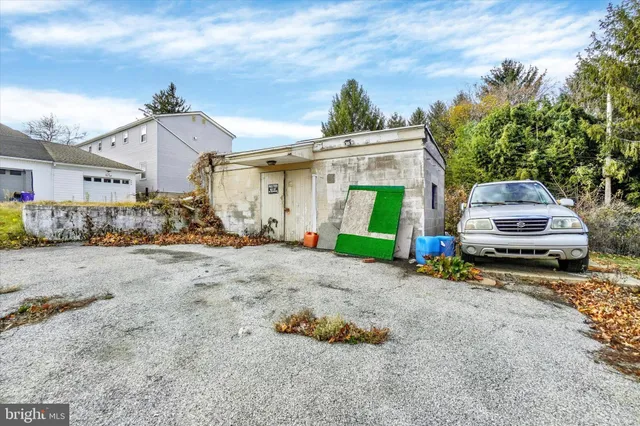 a car parked in front of a house