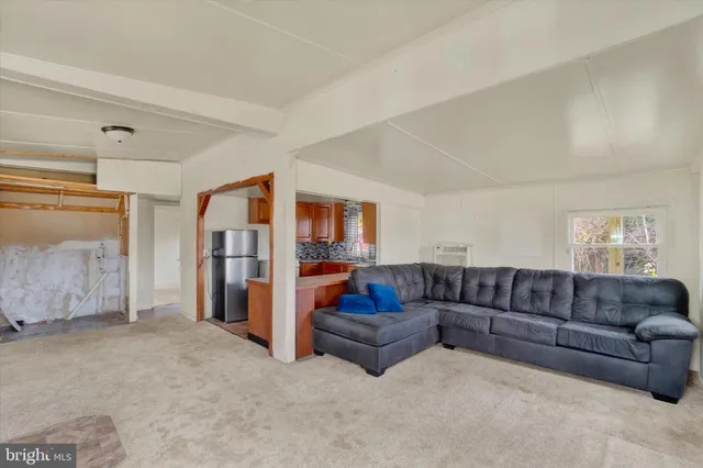 a living room with furniture and a couch