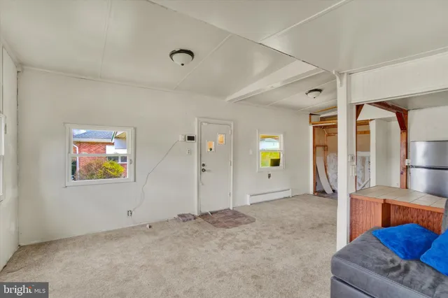 a view of livingroom with furniture and wooden floor