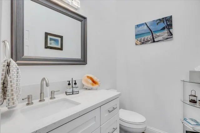 a kitchen with a sink cabinets and window