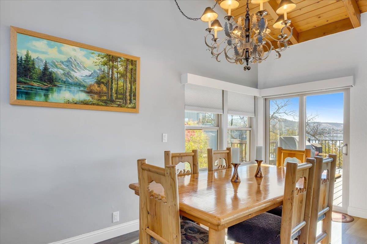 816 Foothill Road, Unit 2 Copperopolis, CA 95228 - Photo 34 of 99 a view of a dining room with furniture wooden floor and chandelier