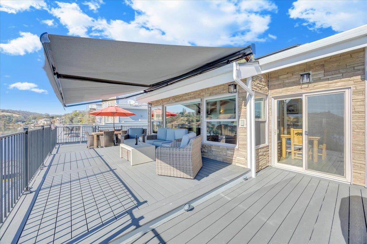 816 Foothill Road, Unit 2 Copperopolis, CA 95228 - Photo 38 of 99 a view of a patio with couches and table with wooden floor