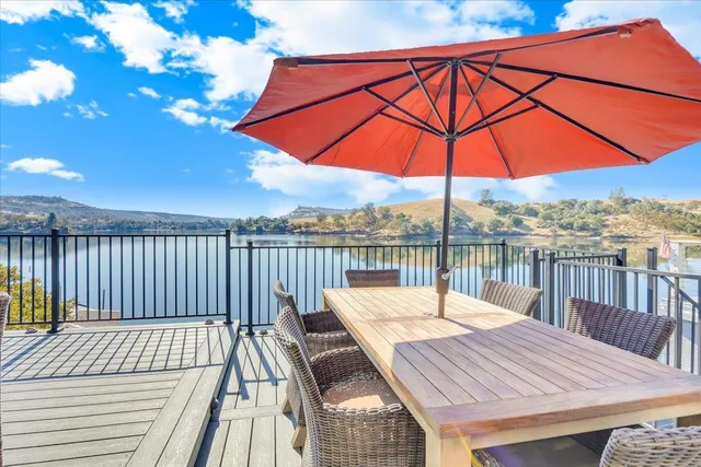a bedroom that has a bed and a chandelier