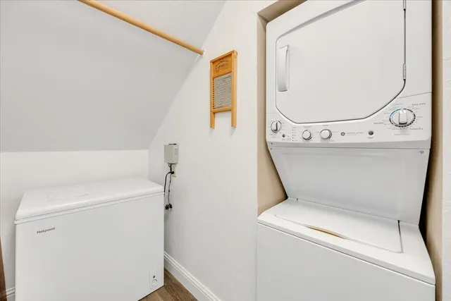 a view of a house with pool and sitting area