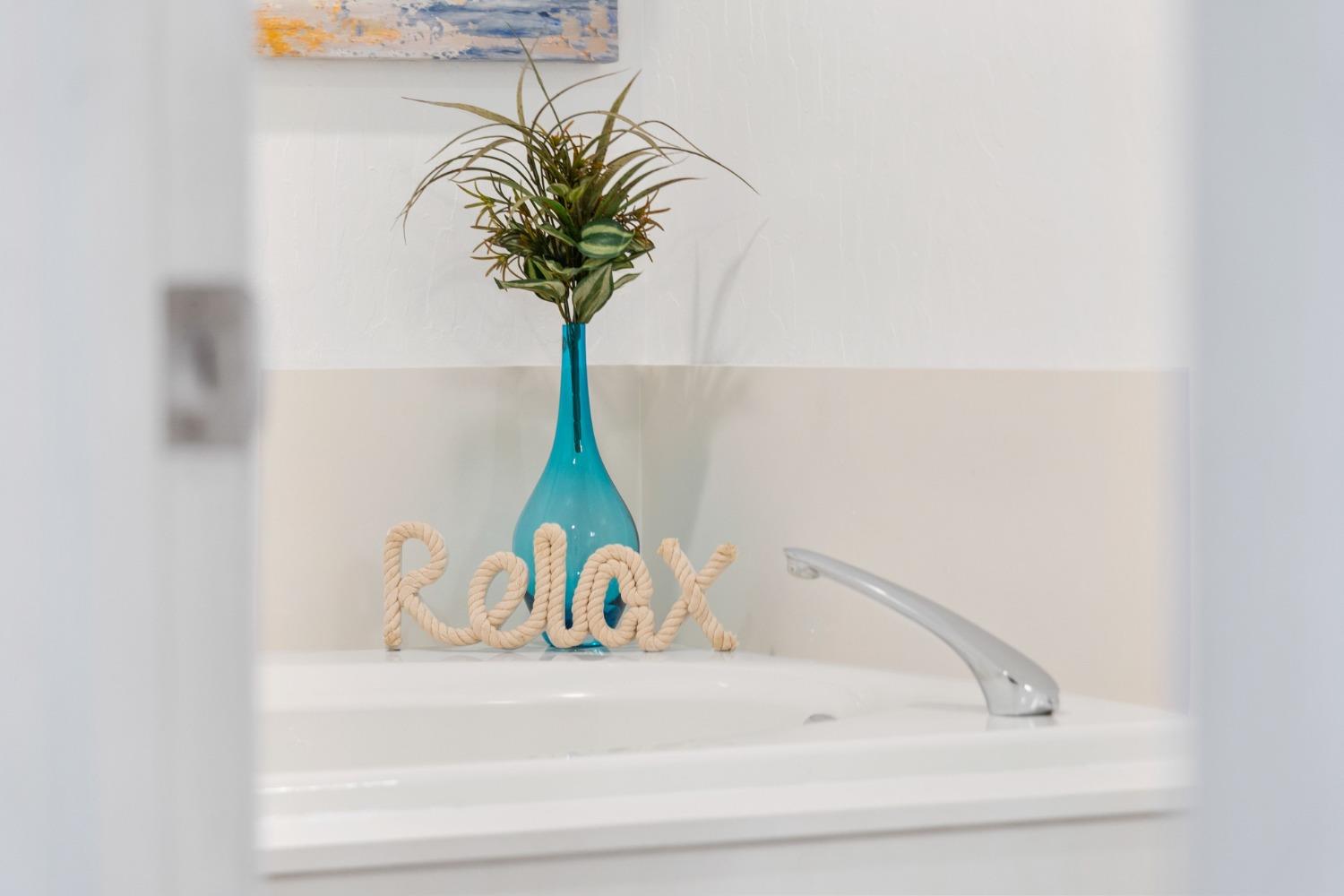 816 Foothill Road, Unit 2 Copperopolis, CA 95228 - Photo 53 of 99 a close view of sink with a potted plant