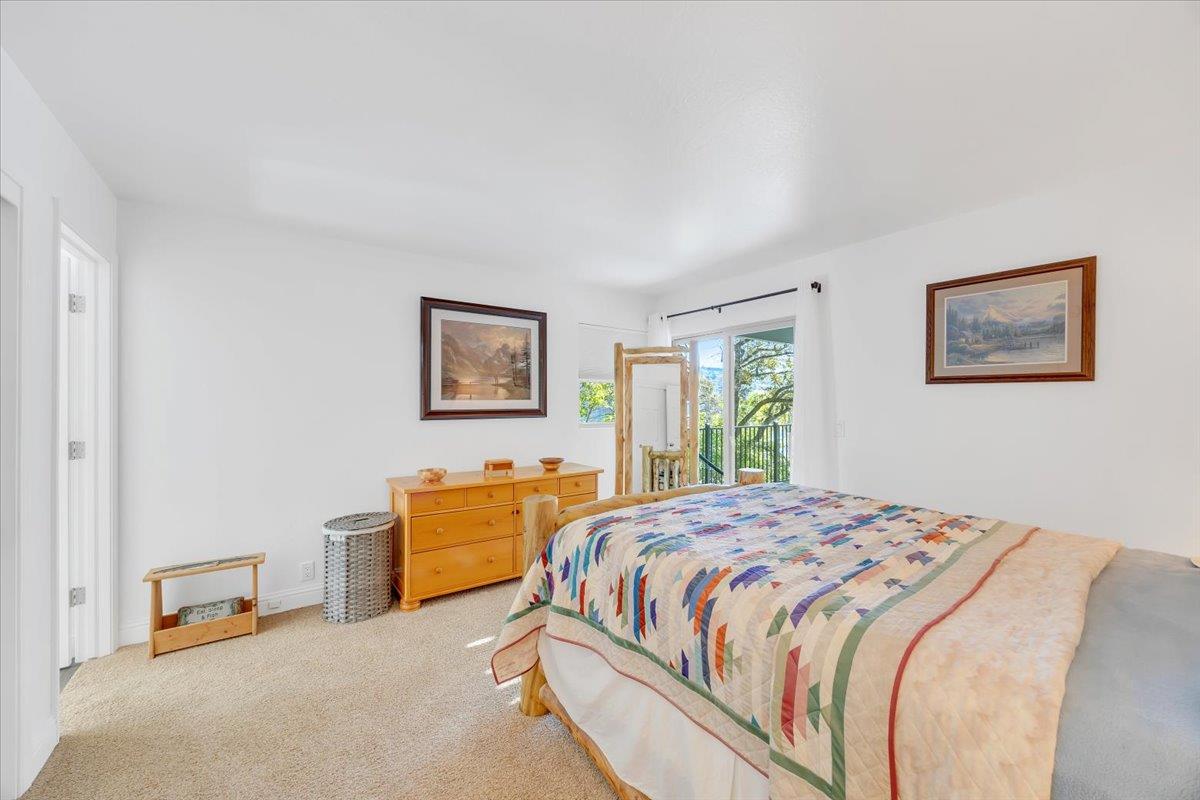 816 Foothill Road, Unit 2 Copperopolis, CA 95228 - Photo 61 of 99 a bedroom with a bed and a couch