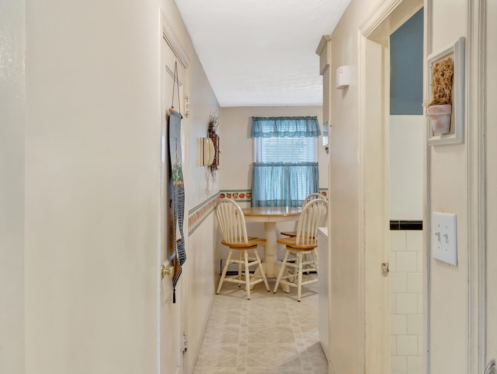 5 G Street Hull, MA 02045 - Photo 17 of 41 a dining room with furniture and a table