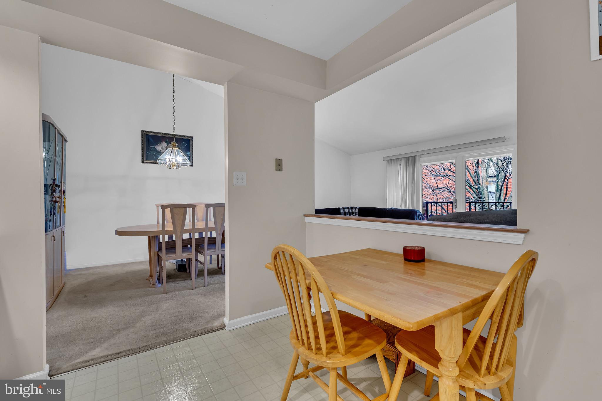 2015 Welsh Road, Unit A22 Philadelphia, PA 19115 - Photo 12 of 27 a view of a dining room with furniture