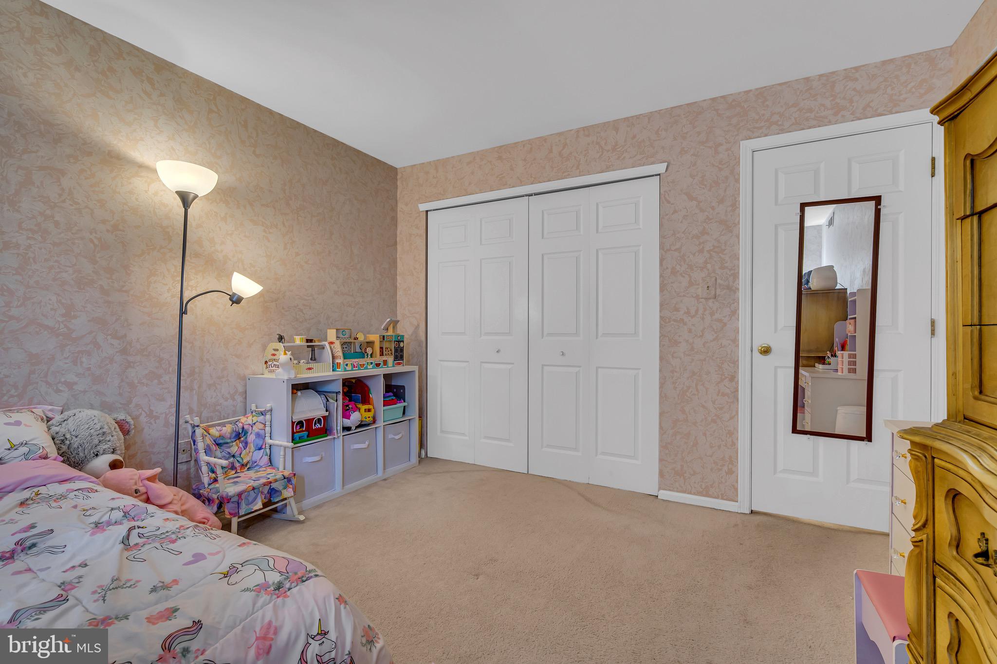 2015 Welsh Road, Unit A22 Philadelphia, PA 19115 - Photo 17 of 27 a bedroom with a bed and a view of bedroom