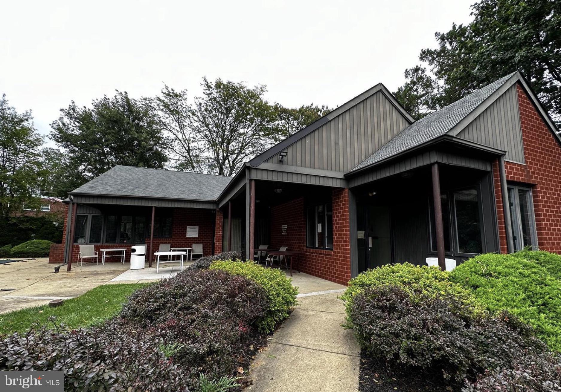 2015 Welsh Road, Unit A22 Philadelphia, PA 19115 - Photo 25 of 27 a front view of a house with patio
