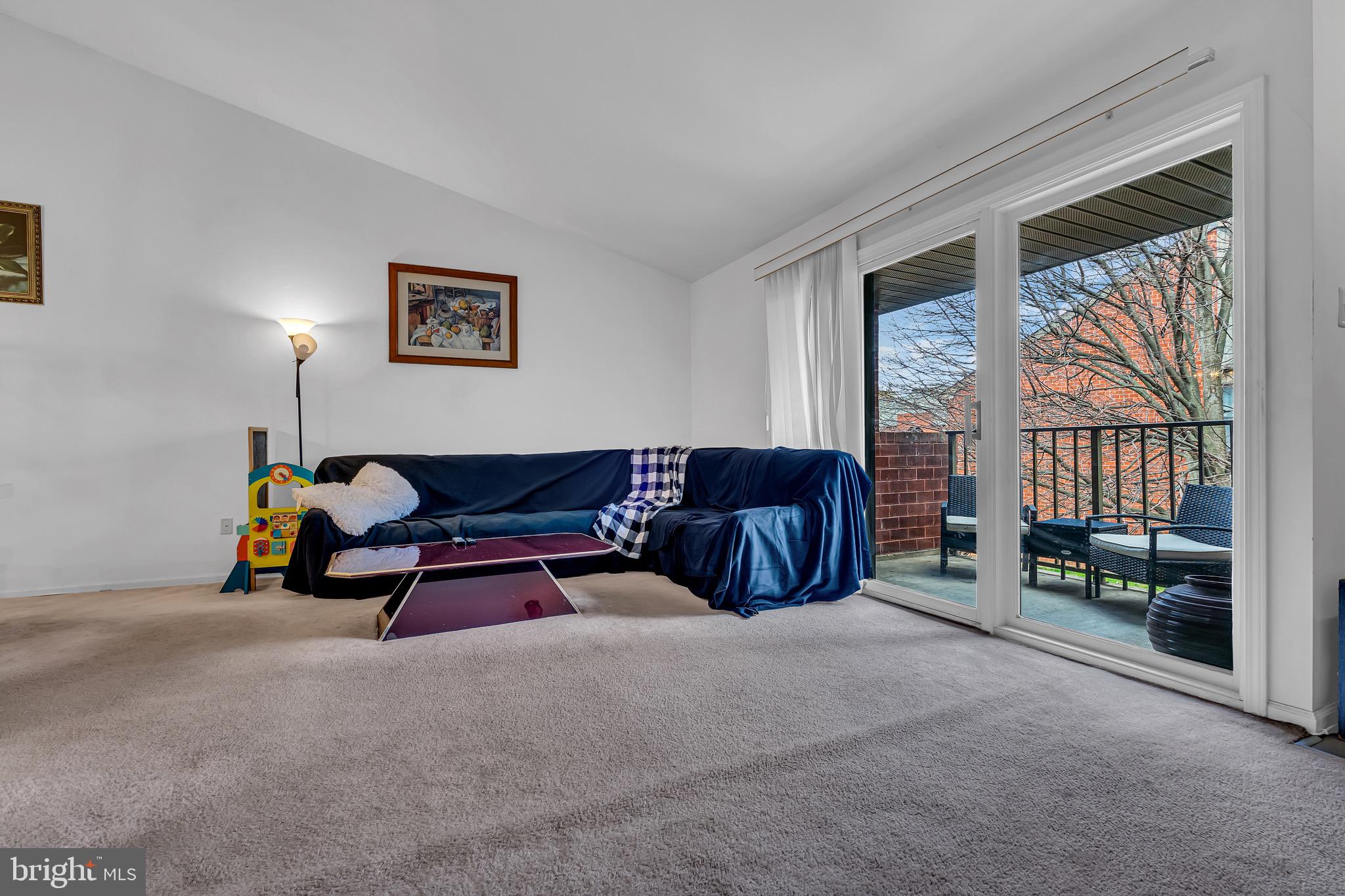 2015 Welsh Road, Unit A22 Philadelphia, PA 19115 - Photo 5 of 27 a spacious bedroom with a bed and a window