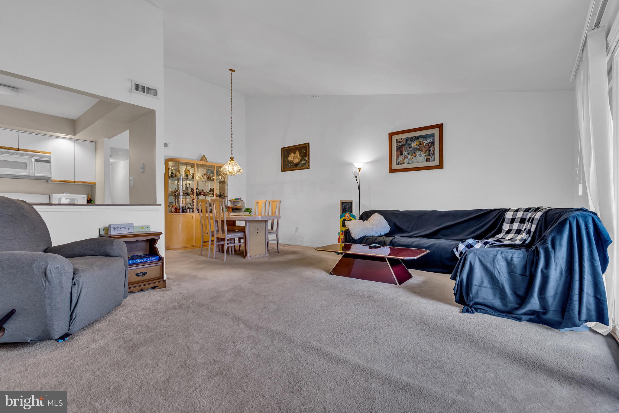 2015 Welsh Road, Unit A22 Philadelphia, PA 19115 - Photo 7 of 27 a living room with furniture and a couch