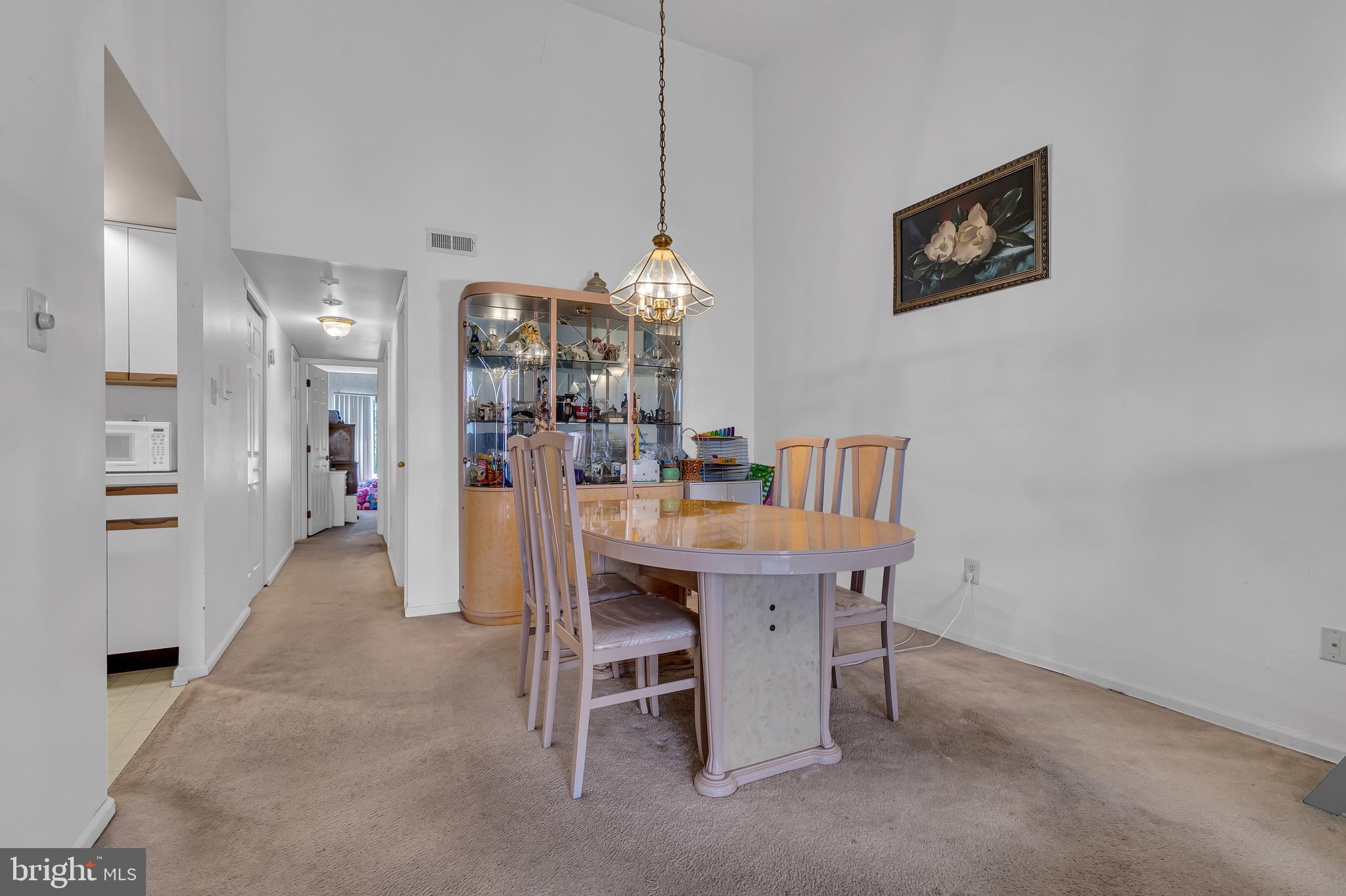 2015 Welsh Road, Unit A22 Philadelphia, PA 19115 - Photo 8 of 27 a view of a dining room with furniture