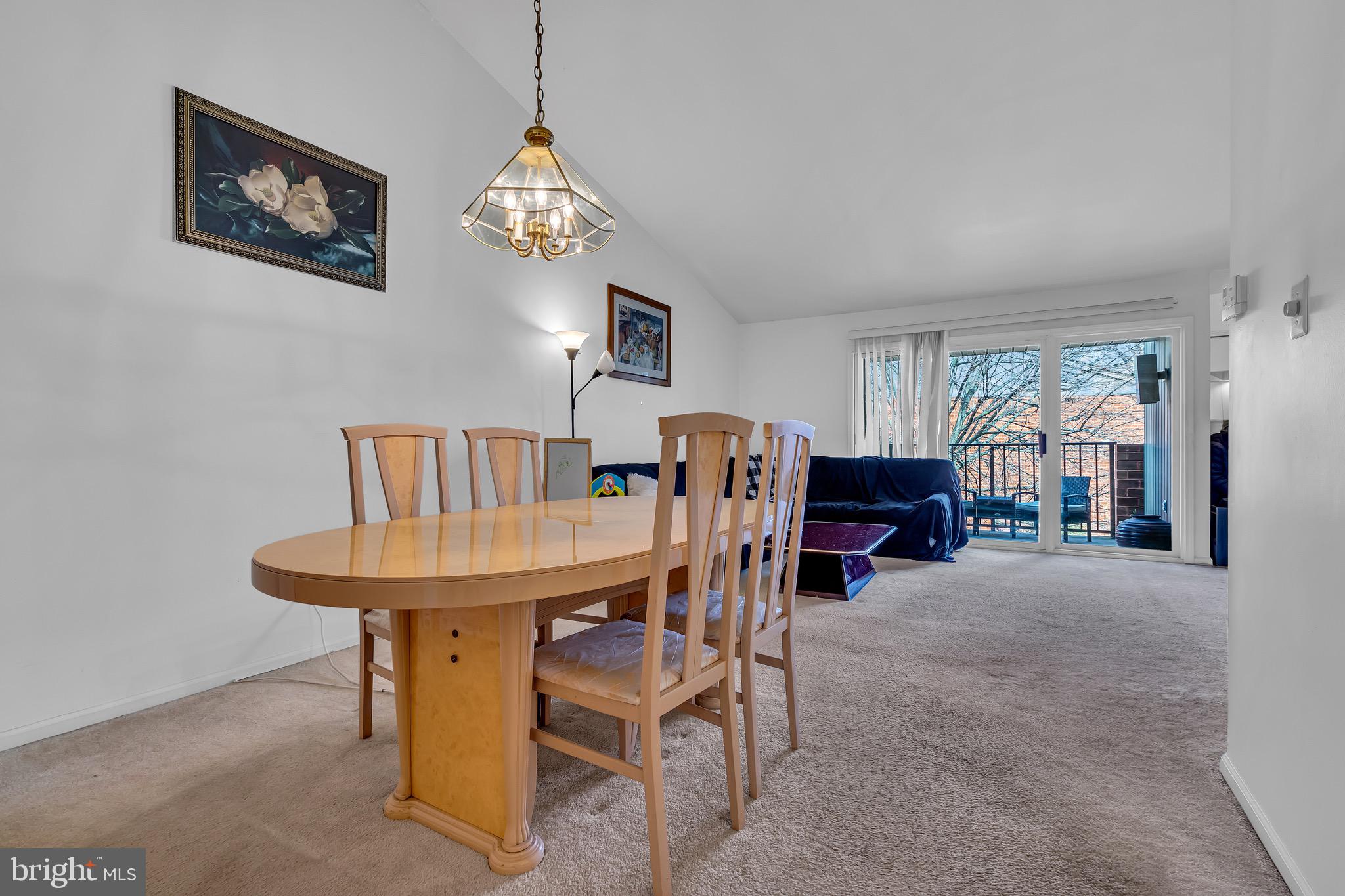 2015 Welsh Road, Unit A22 Philadelphia, PA 19115 - Photo 9 of 27 a view of a dining room with furniture window and wooden floor