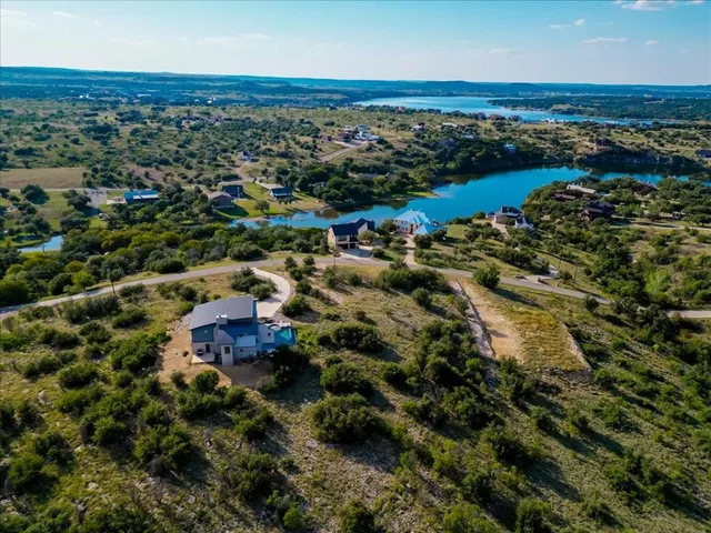 an aerial view of residential building with parking space
