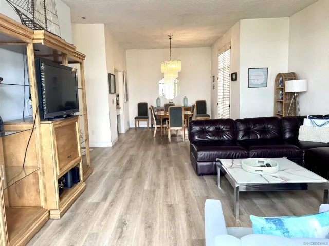 a living room with a couch and a flat screen tv